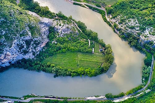 Italy-Adige river bend and vineyards Art Print